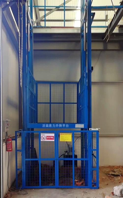 胜力机械专业定做2吨液压升降货梯 工厂仓库楼层货物运输设备 - 产品